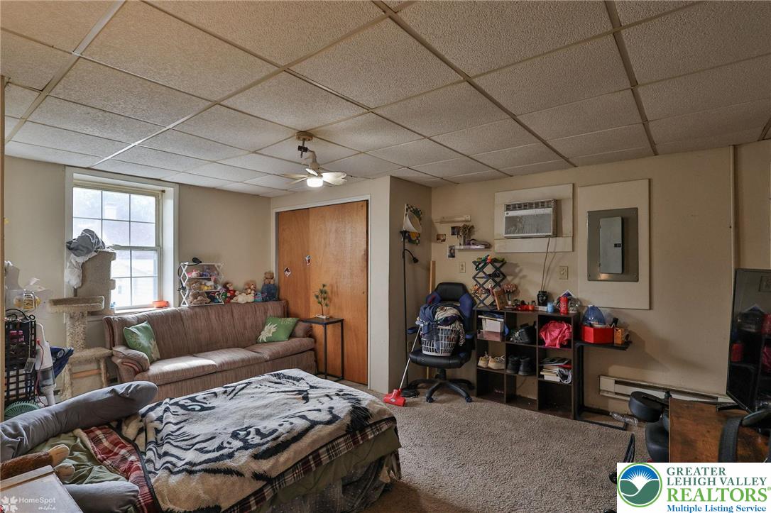 214 West Ridge Street Lansford, PA 18232 - Photo 35 of 52 a bedroom with furniture and a window