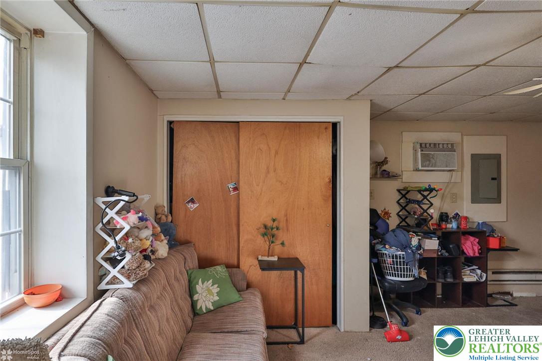 214 West Ridge Street Lansford, PA 18232 - Photo 37 of 52 a living room with furniture and a potted plant