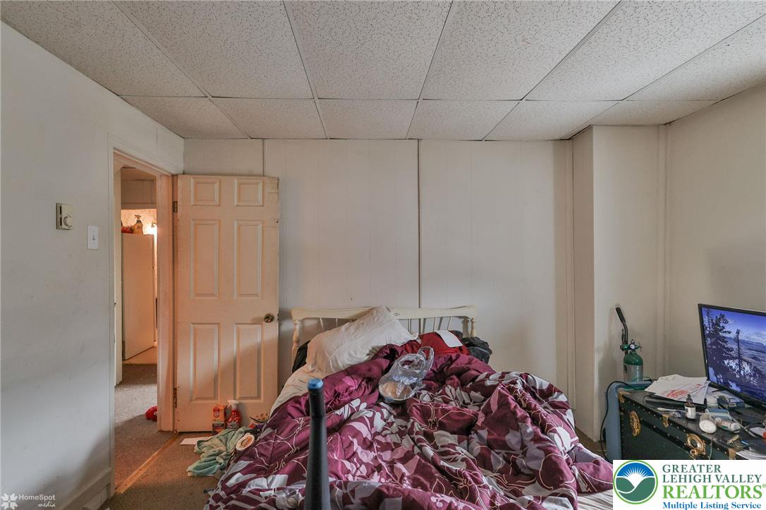 214 West Ridge Street Lansford, PA 18232 - Photo 43 of 52 a bedroom with a bed and a window