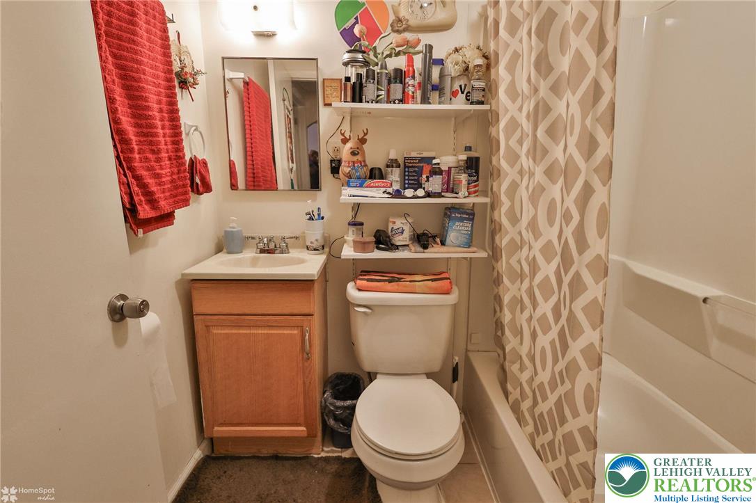 214 West Ridge Street Lansford, PA 18232 - Photo 51 of 52 a bathroom with a toilet and a sink
