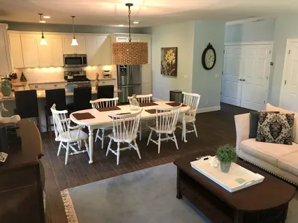 a view of a dining room with furniture