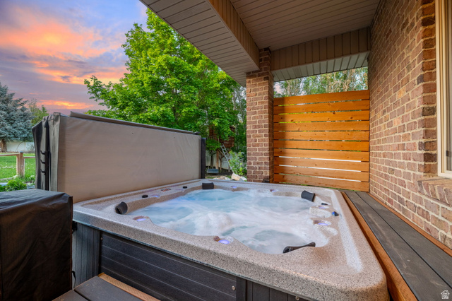6208 West Bull River Road Highland, UT 84003 - Photo 61 of 90 Covered outdoor spa area featuring a built-in hot tub