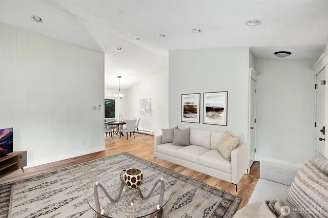 a living room with furniture and a couch