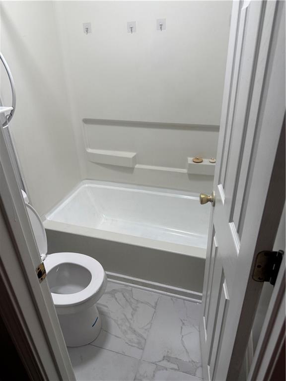 6341 Wedgeview Drive Tucker, GA 30084 - Photo 16 of 26 a bathroom with a toilet and a shower