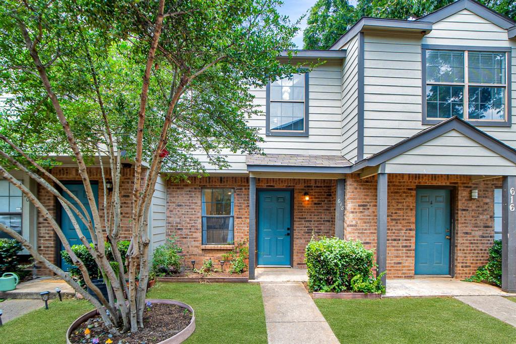 618 West Collins Street Denton, TX 76201 - Photo 1 of 25 Traditional home with covered porch, brick siding, and a front yard