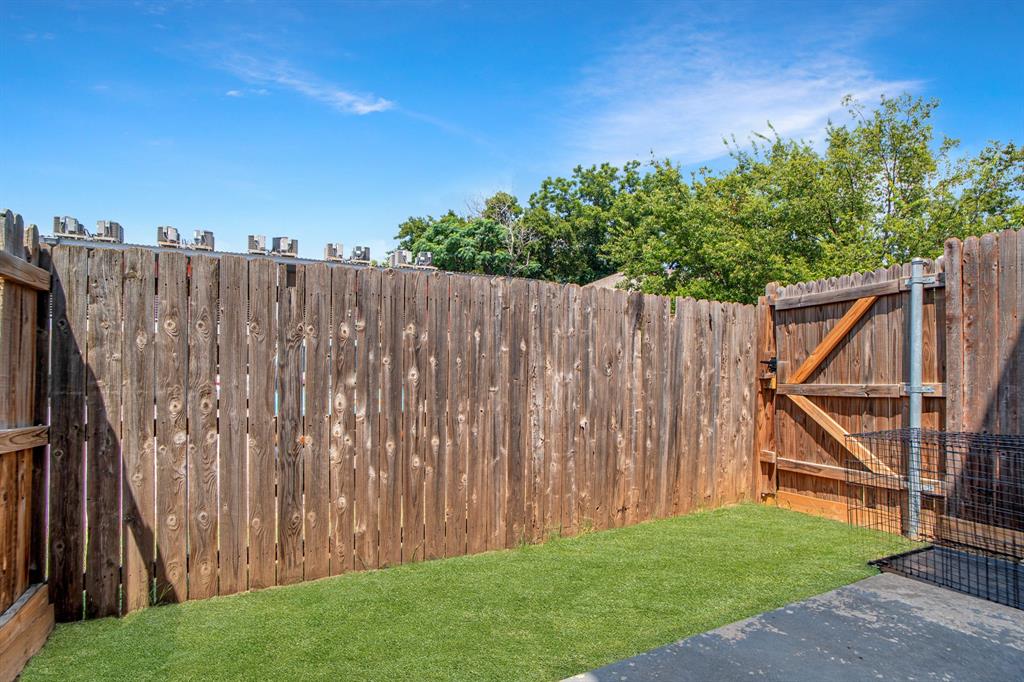 618 West Collins Street Denton, TX 76201 - Photo 25 of 25 View of small yard with a gate
