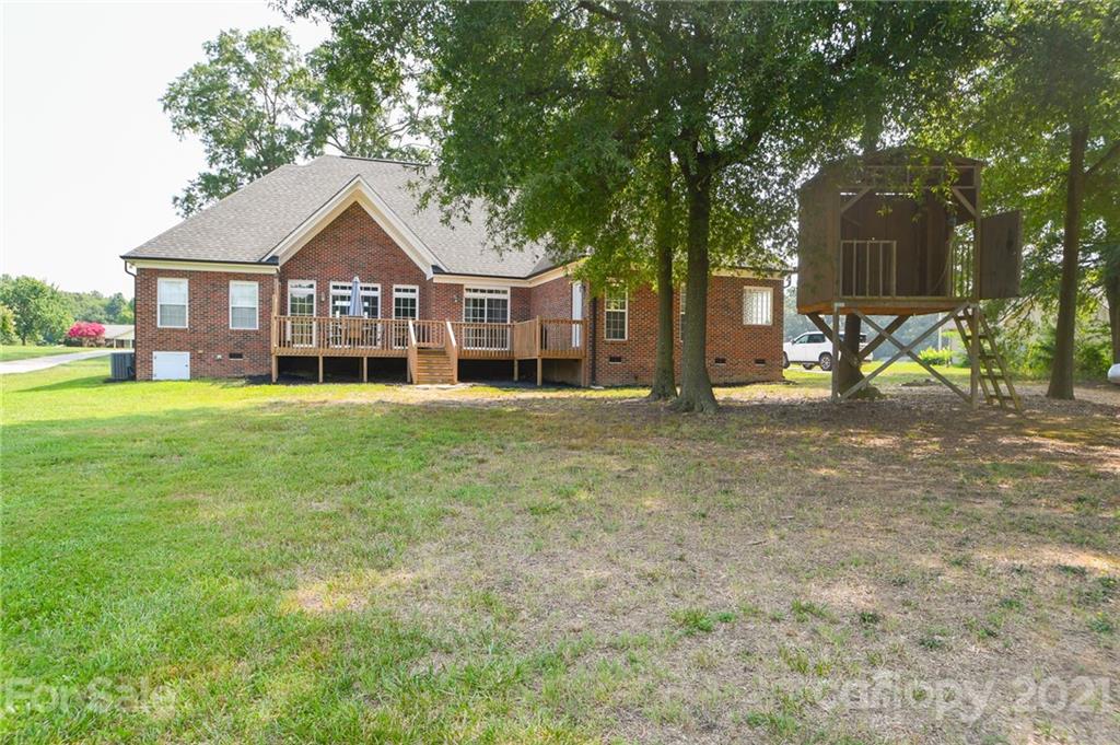 3600 Haigler Road Monroe, NC 28110 - Photo 4 of 30 a view of a house with yard and large trees