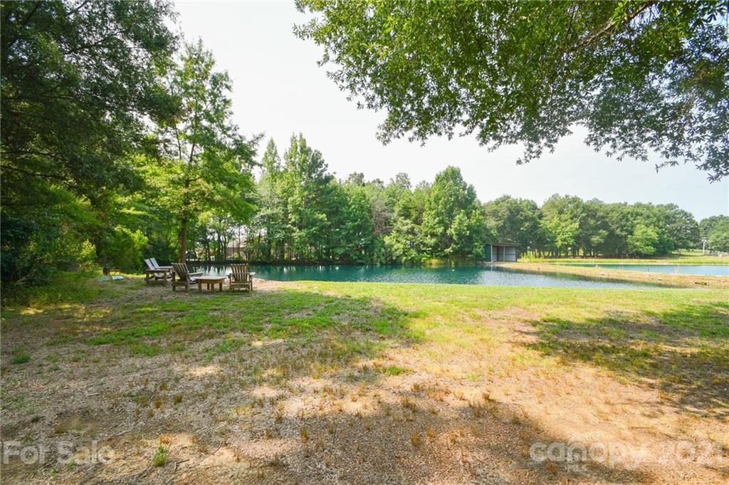 3600 Haigler Road Monroe, NC 28110 - Photo 5 of 30 a view of a green yard with a tree