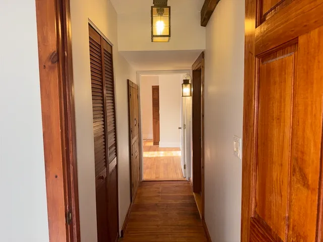 a bathroom with a glass shower door