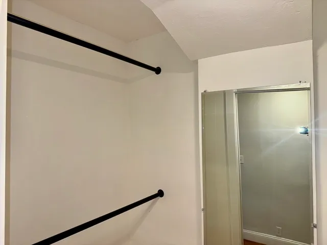 a bathroom with a sink a washer and dryer