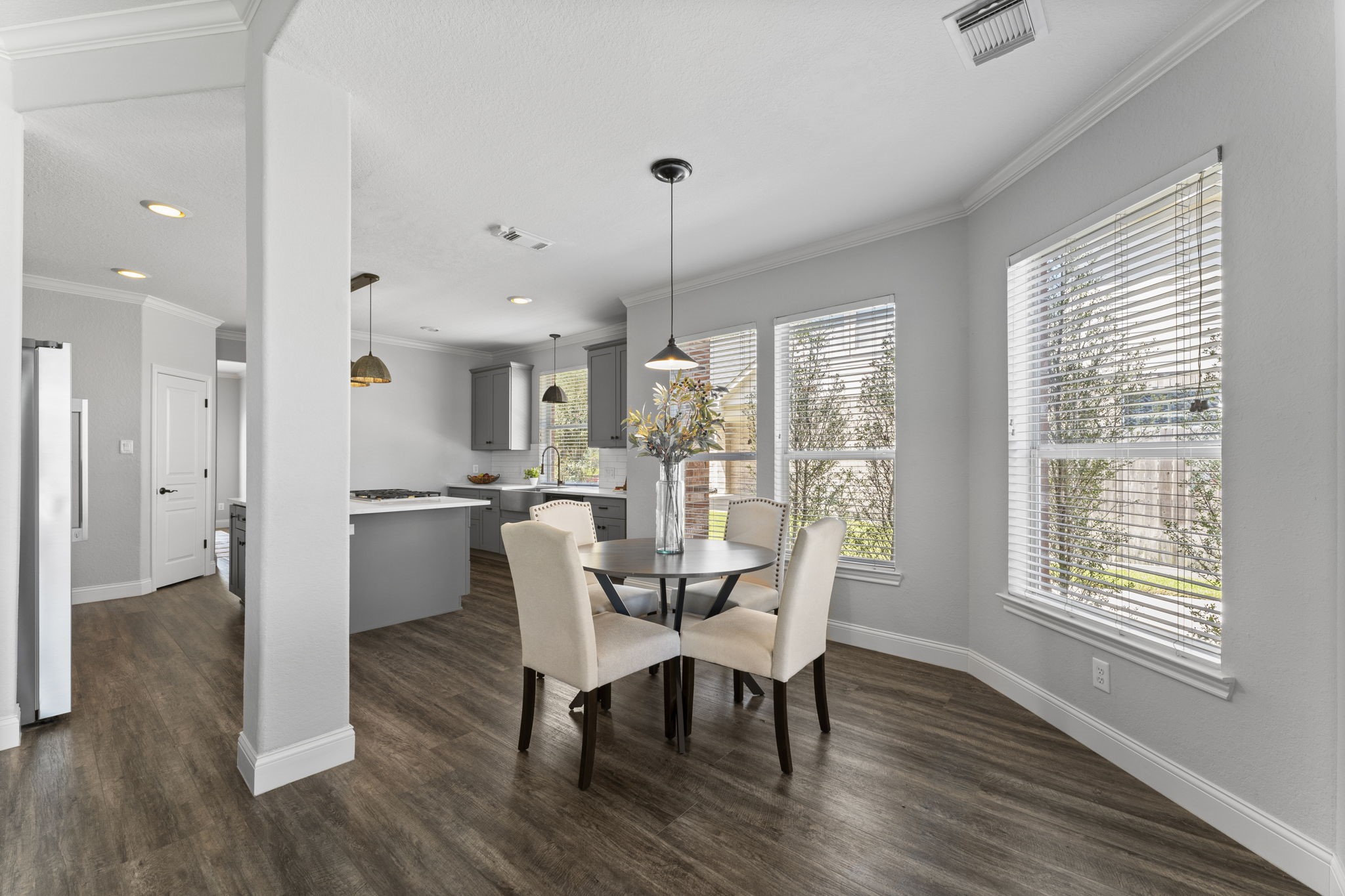 19218 Country Village Drive Spring, TX 77388 - Photo 15 of 35 a view of a dining room with furniture window and wooden floor