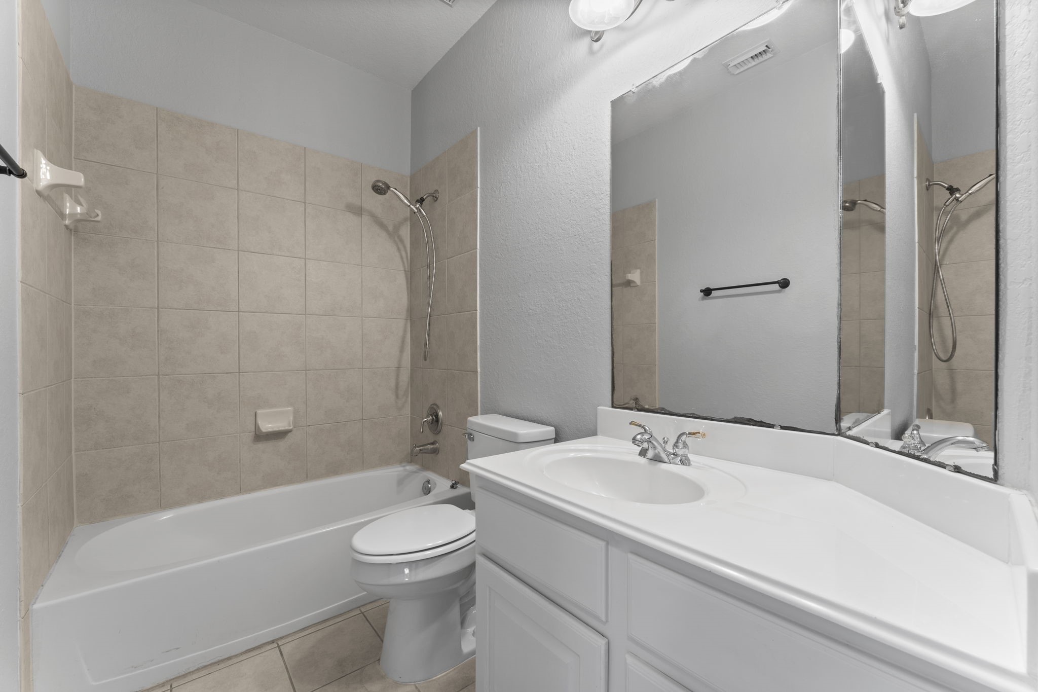 19218 Country Village Drive Spring, TX 77388 - Photo 28 of 35 a bathroom with a sink a toilet and shower