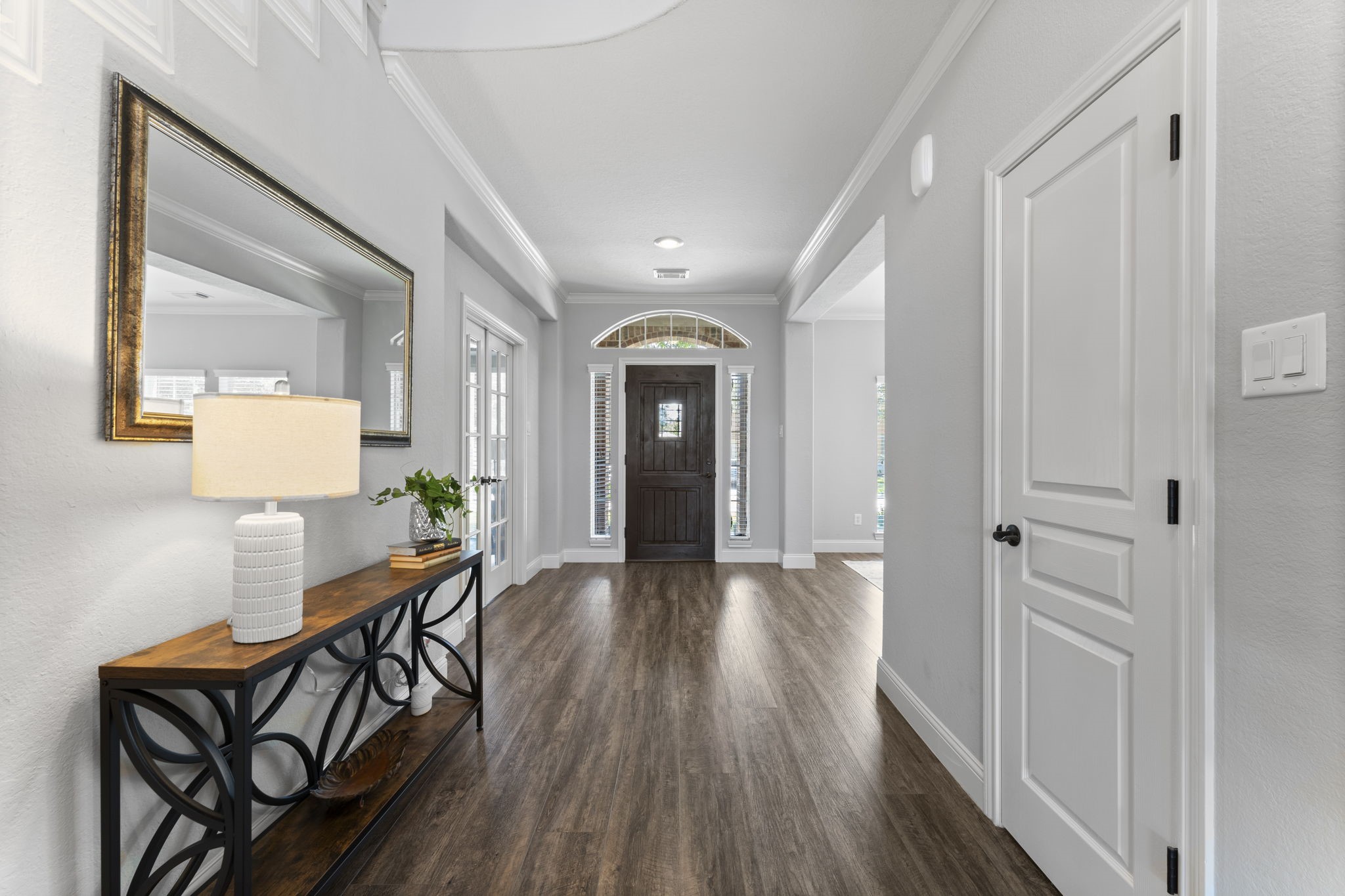 19218 Country Village Drive Spring, TX 77388 - Photo 5 of 35 a view of a hallway and wooden floor an entryway