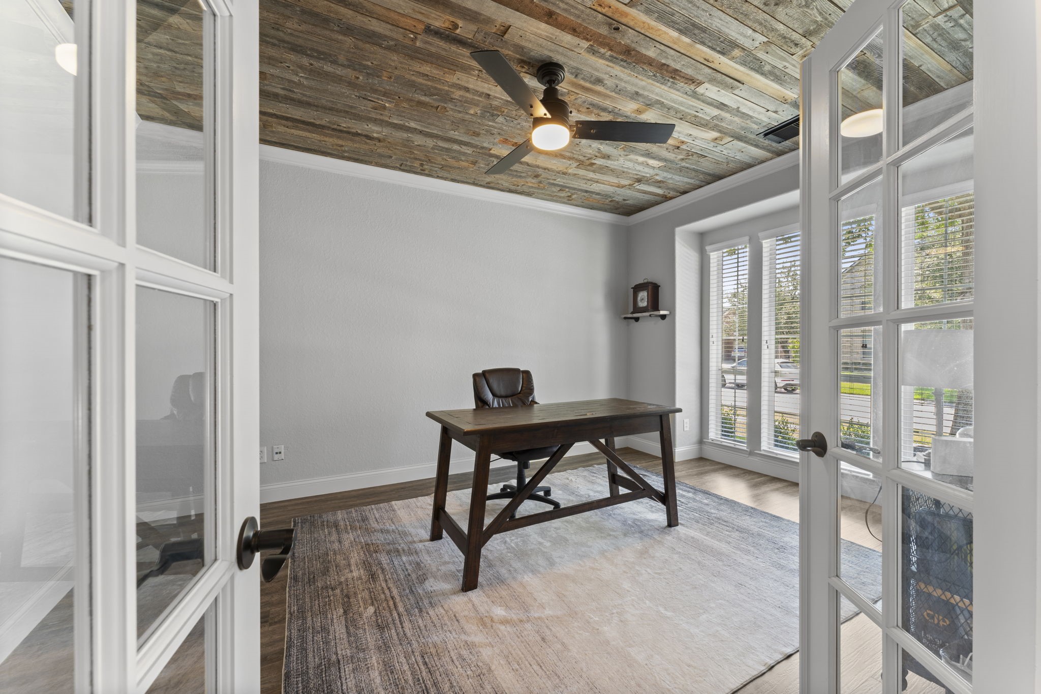 19218 Country Village Drive Spring, TX 77388 - Photo 8 of 35 a view of a workspace with furniture and a window