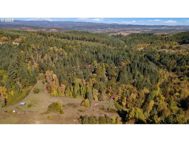 a black and white photo of a house