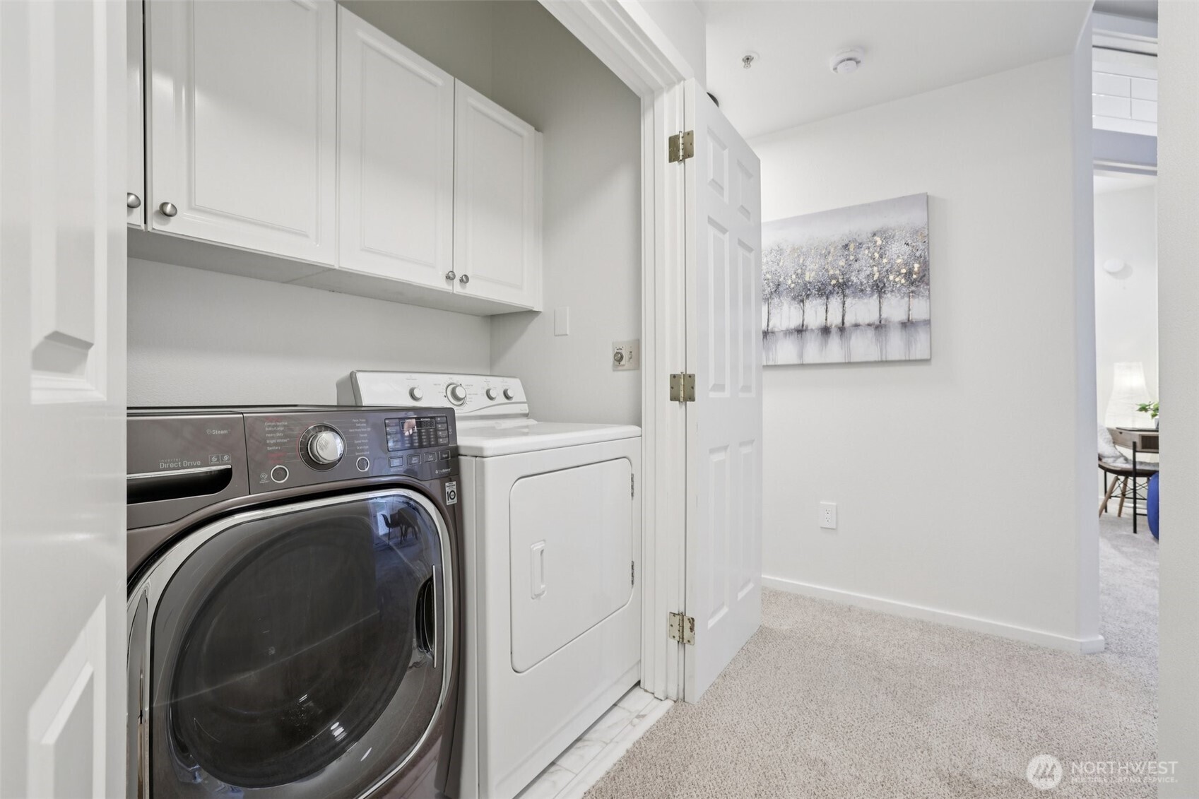 4322 Northeast 5th Court, Unit 105 Renton, WA 98059 - Photo 20 of 36 a utility room with dryer and washer