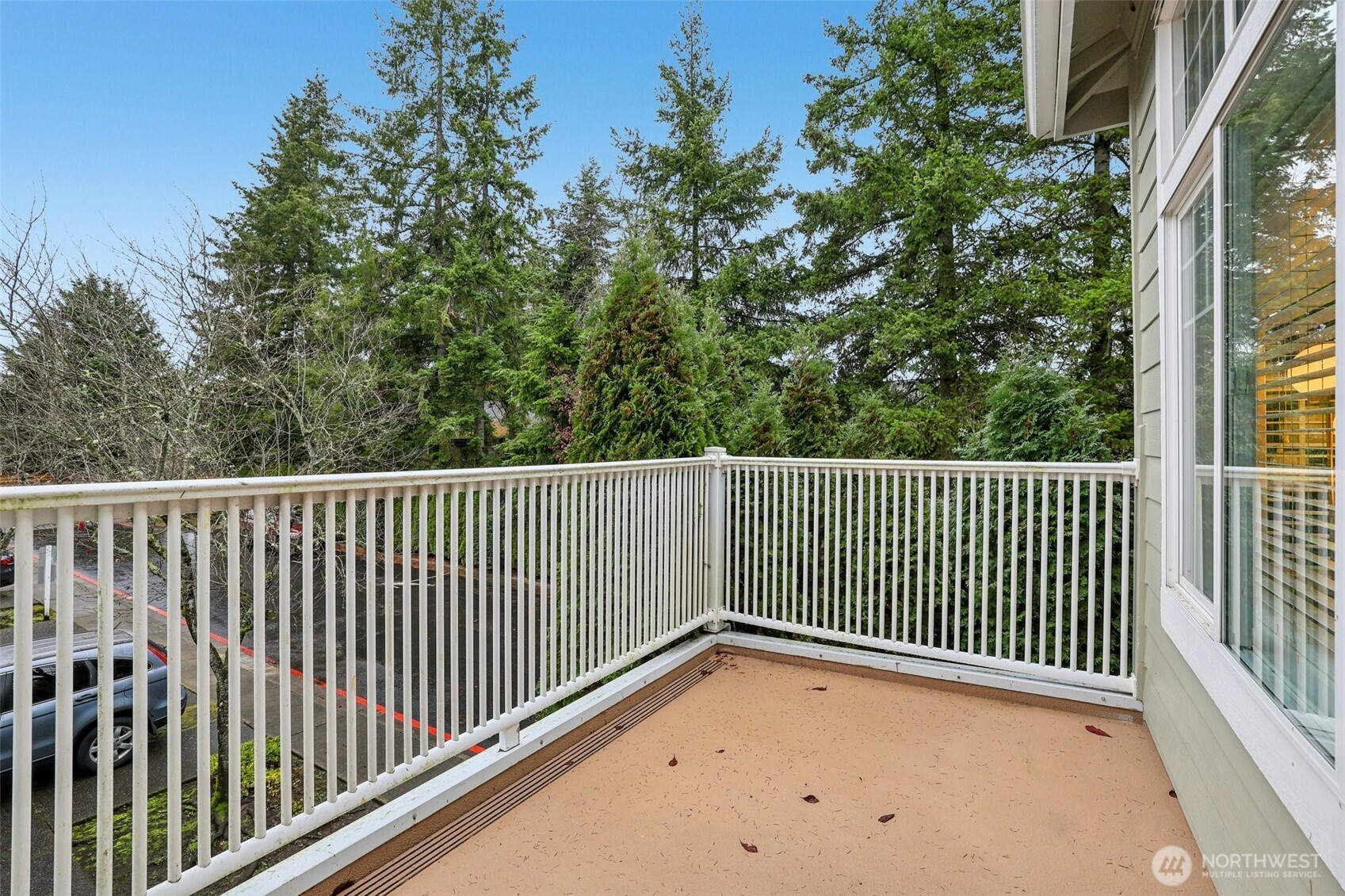 4322 Northeast 5th Court, Unit 105 Renton, WA 98059 - Photo 31 of 36 a view of a balcony with wooden floor