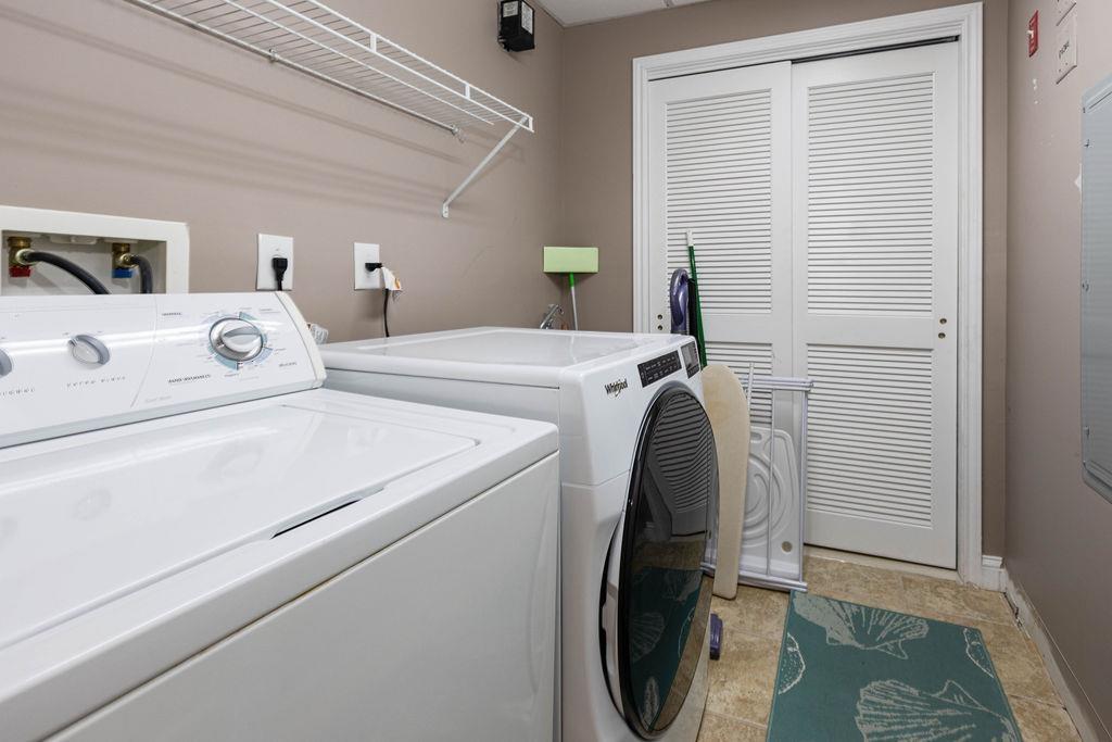 415 East Heather Road, Unit 106 Wildwood Crest, NJ 08260 - Photo 23 of 41 a utility room with dryer and washer