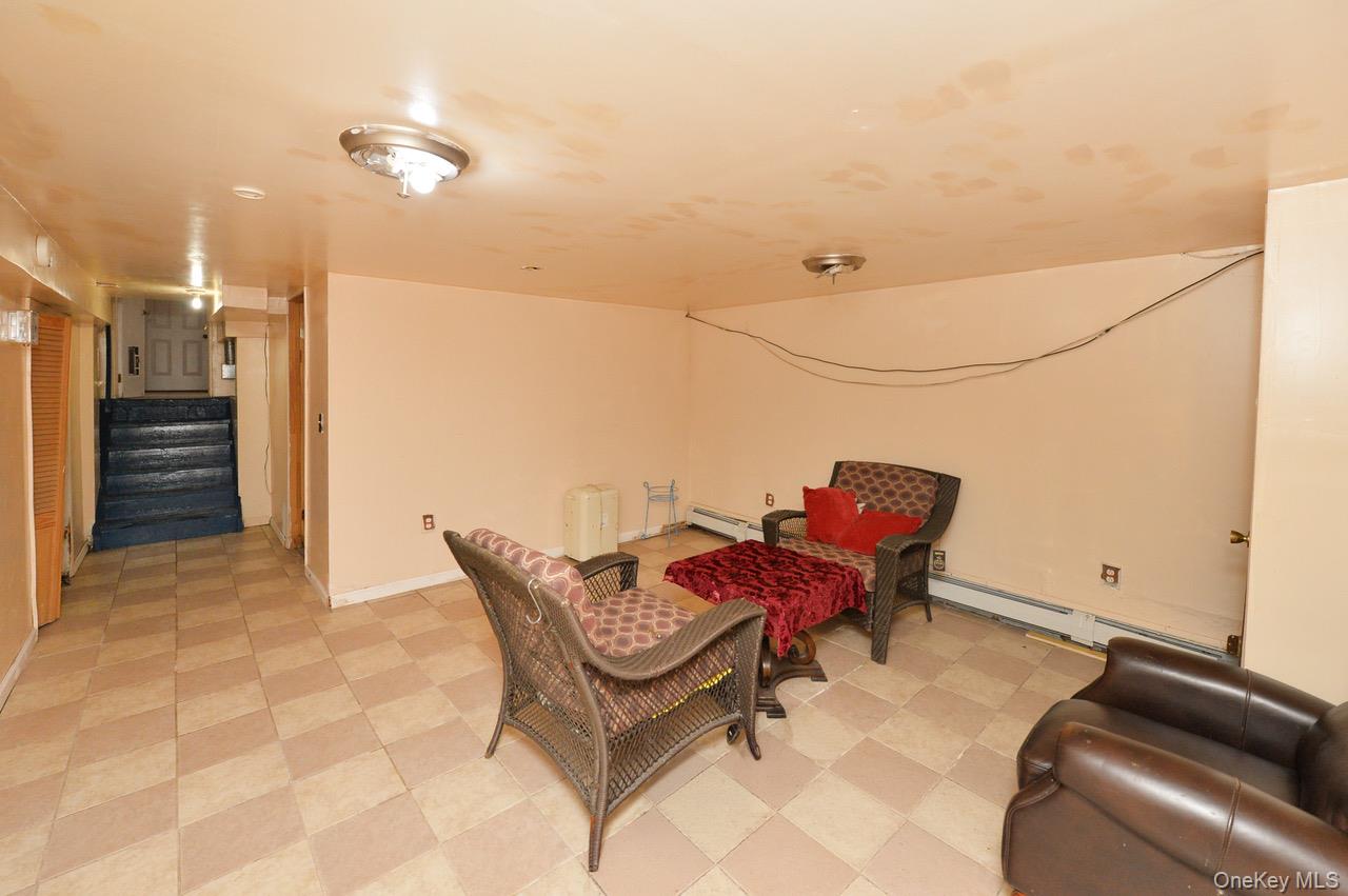 7 South Oak Street Spring Valley, NY 10977 - Photo 16 of 24 a building outdoor space with patio furniture