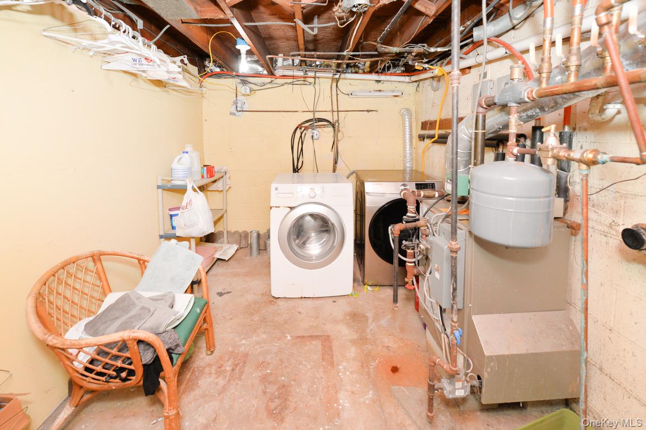 7 South Oak Street Spring Valley, NY 10977 - Photo 21 of 24 a utility room with dryer and washer