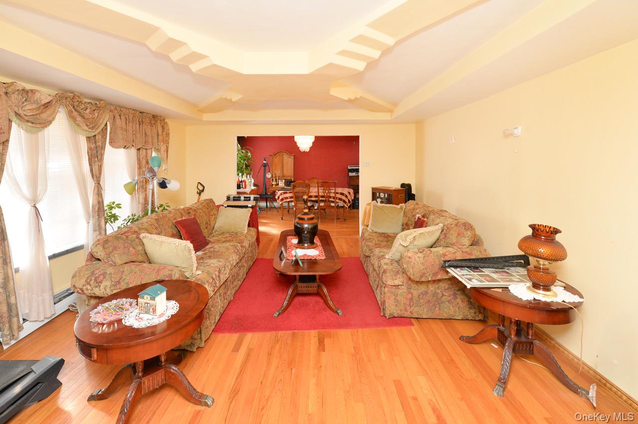 7 South Oak Street Spring Valley, NY 10977 - Photo 3 of 24 a living room with furniture and a large window