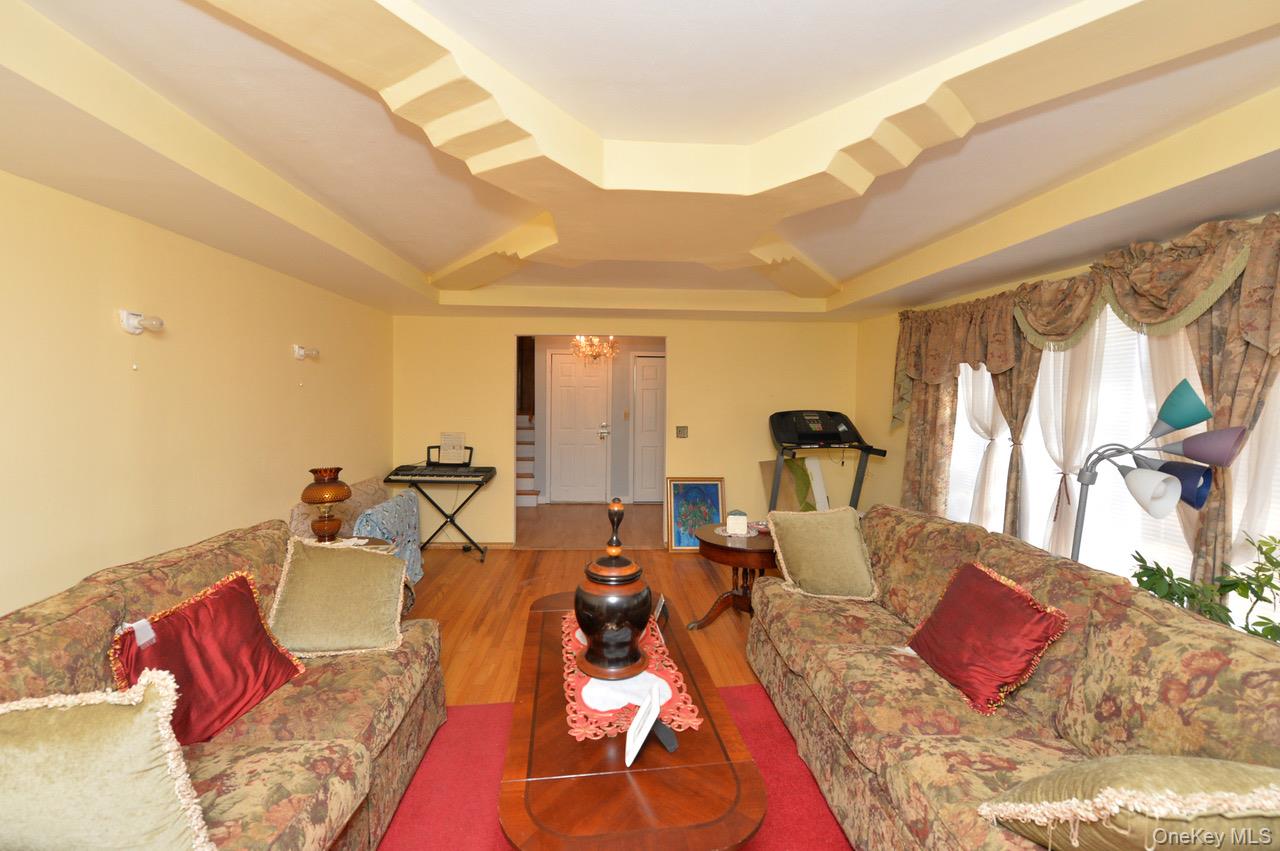 7 South Oak Street Spring Valley, NY 10977 - Photo 5 of 24 a living room with furniture and a large window