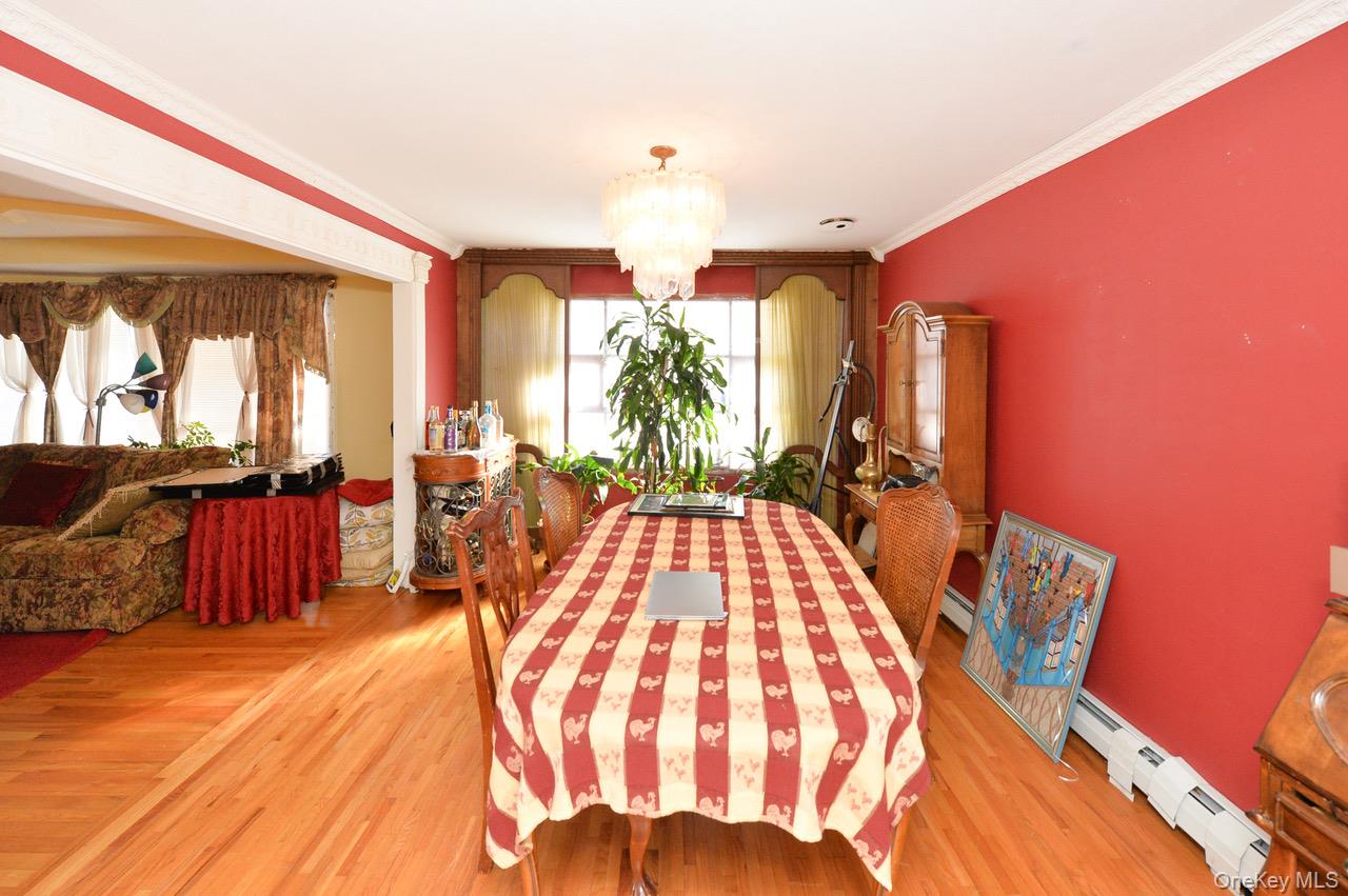 7 South Oak Street Spring Valley, NY 10977 - Photo 6 of 24 a view of a living room and dining room