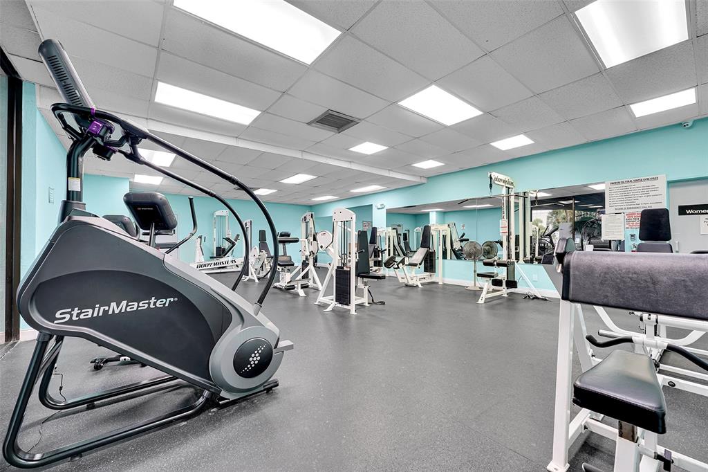 7041 Environ Boulevard, Unit 326 Lauderhill, FL 33319 - Photo 22 of 44 a view of a room with gym equipment