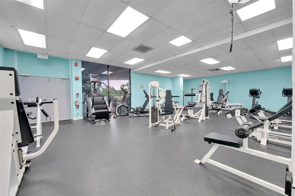 7041 Environ Boulevard, Unit 326 Lauderhill, FL 33319 - Photo 23 of 44 a view of a room with gym equipment