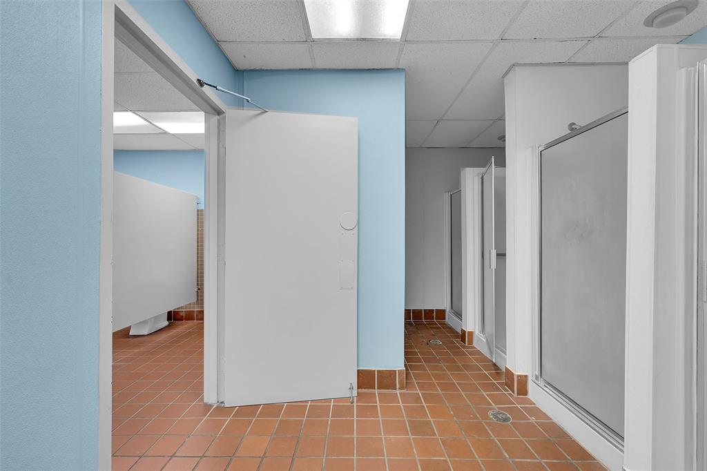 7041 Environ Boulevard, Unit 326 Lauderhill, FL 33319 - Photo 25 of 44 a view of a livingroom with wooden floor and a hallway