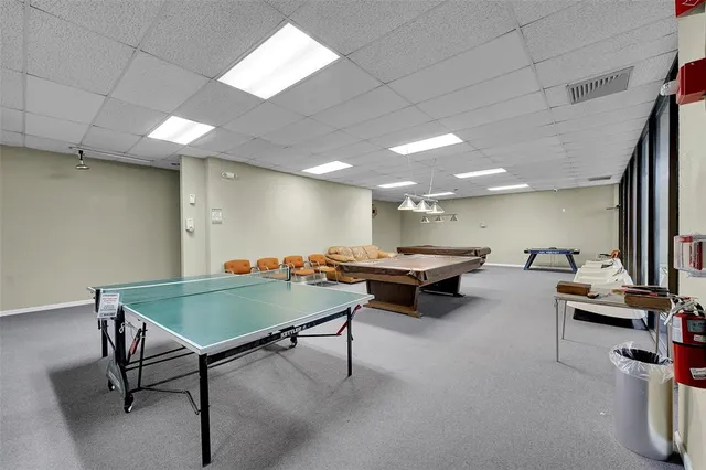 a room with furniture and a rug