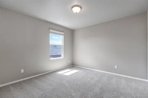 an empty room with a window