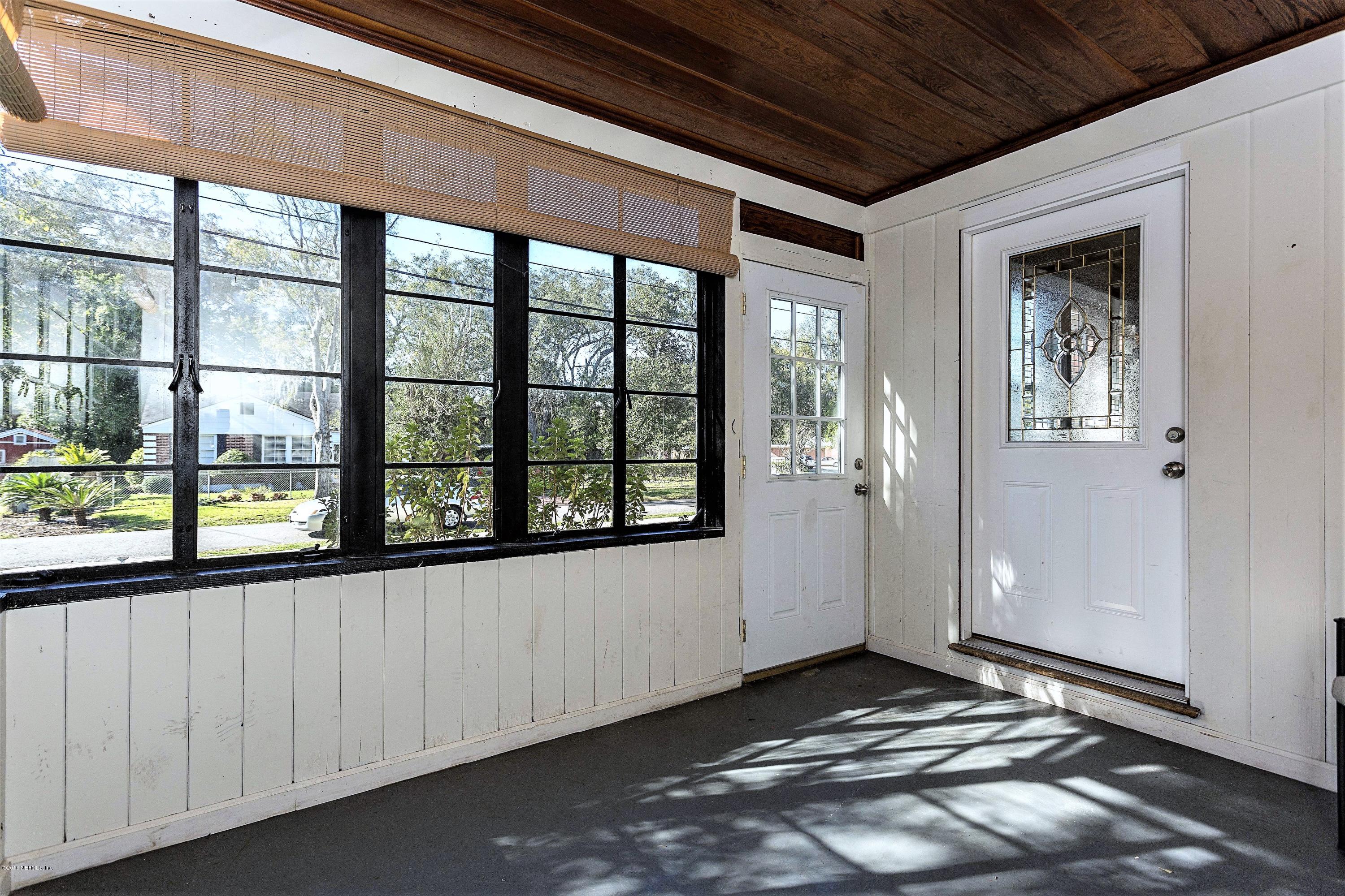 2309 Somerset Road Jacksonville, FL 32210 - Photo 3 of 21 a view of an empty room with a window