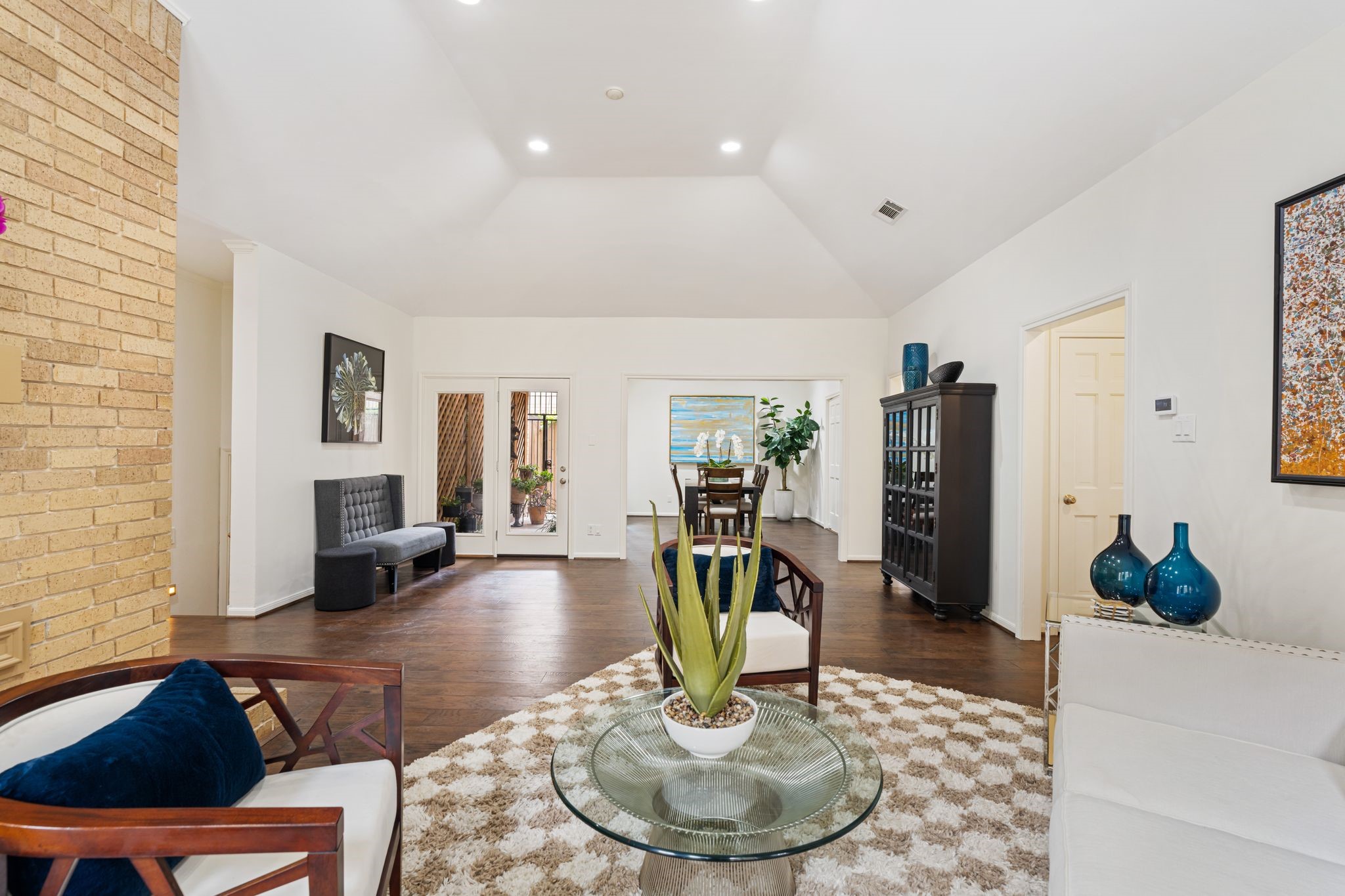7416 Kelving Street Houston, TX 77030 - Photo 6 of 35 a living room with furniture and a wooden floor