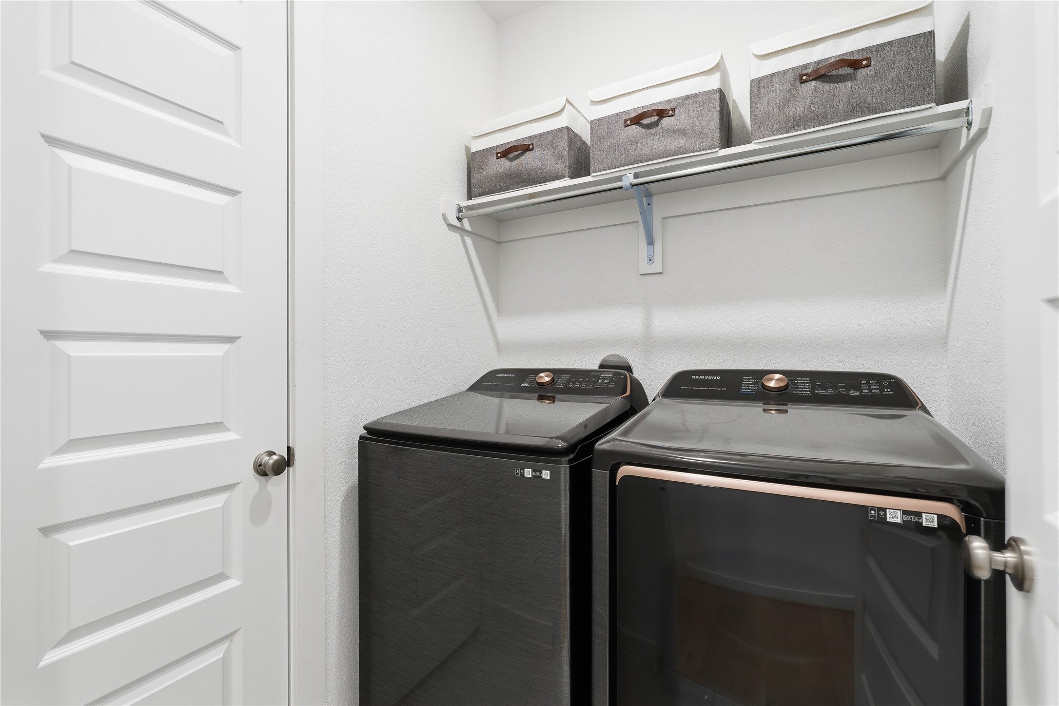 416 Bartlett Street Webster, TX 77598 - Photo 39 of 49 Utility room with built-in shelving