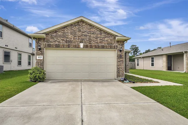 $1,800 | 41523 Stampede Stream Drive, Magnolia, TX 77354