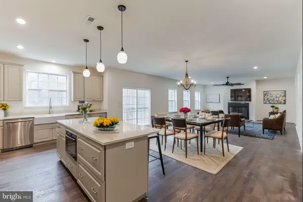 a view of a kitchen and dining table