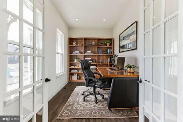 a workspace with furniture and window