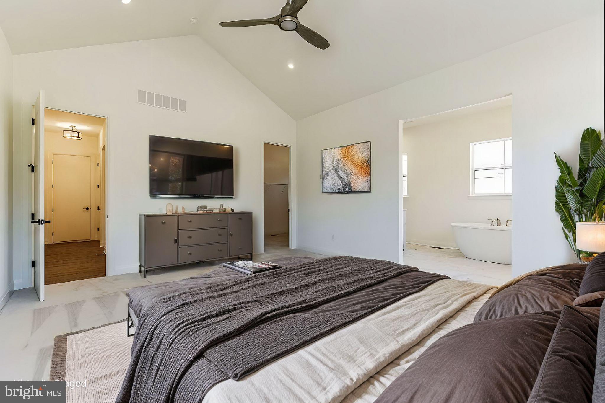 1487 Bunker Hill Road Middletown, DE 19709 - Photo 22 of 33 a bedroom with a bed and a flat screen tv
