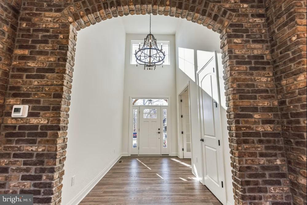 1487 Bunker Hill Road Middletown, DE 19709 - Photo 3 of 33 a view of a hallway with wooden door
