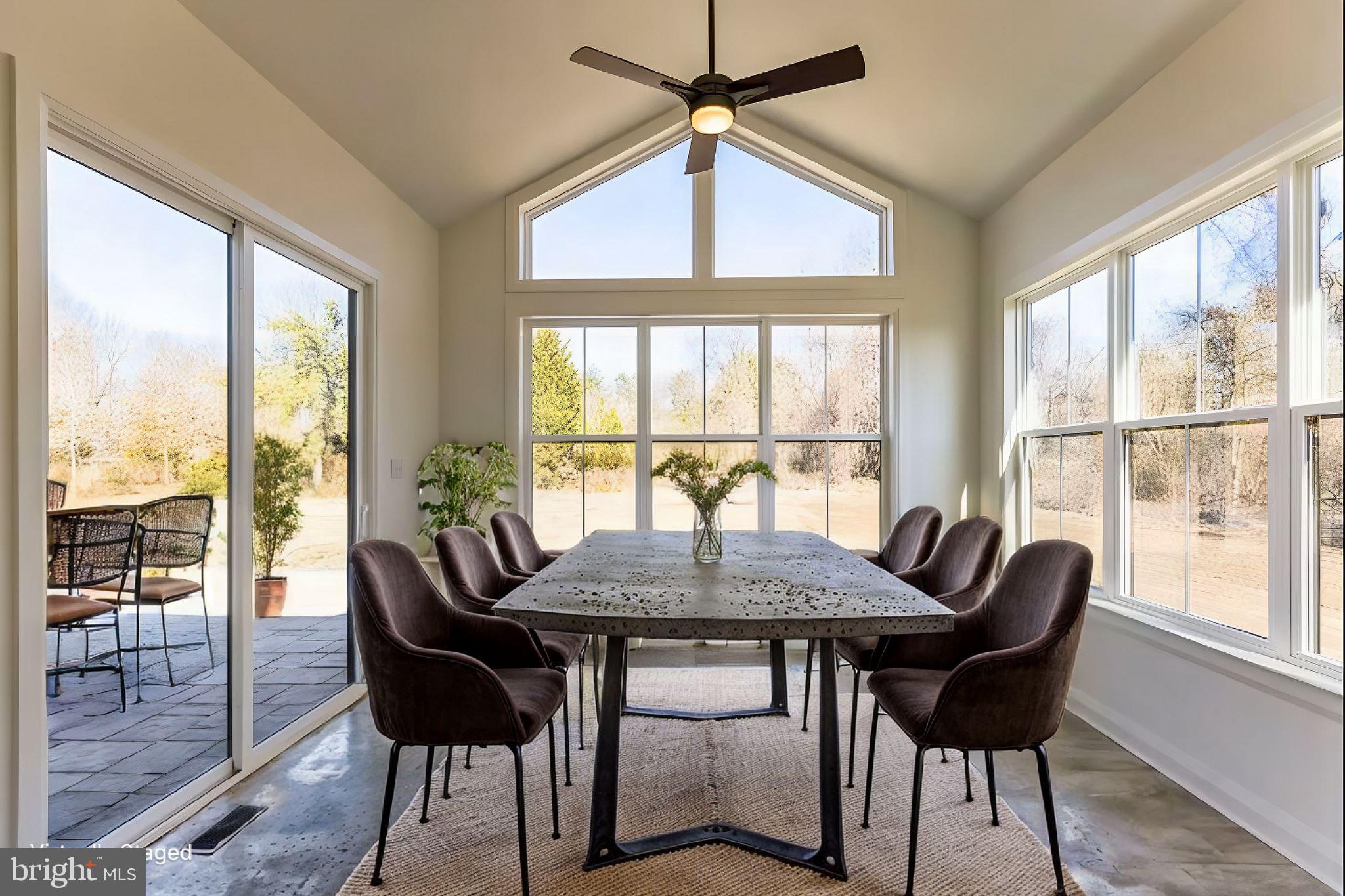 1487 Bunker Hill Road Middletown, DE 19709 - Photo 6 of 33 a view of a dining room with furniture window and wooden floor