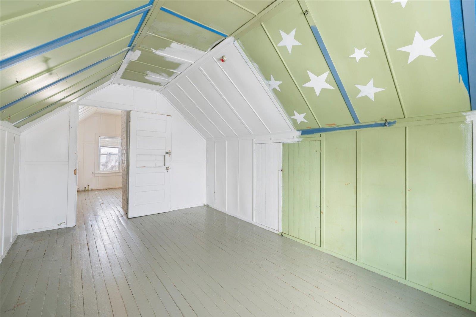 217 3rd Avenue Northwest Chisholm, MN 55719 - Photo 28 of 47 Additional living space featuring lofted ceiling and light wood-style flooring