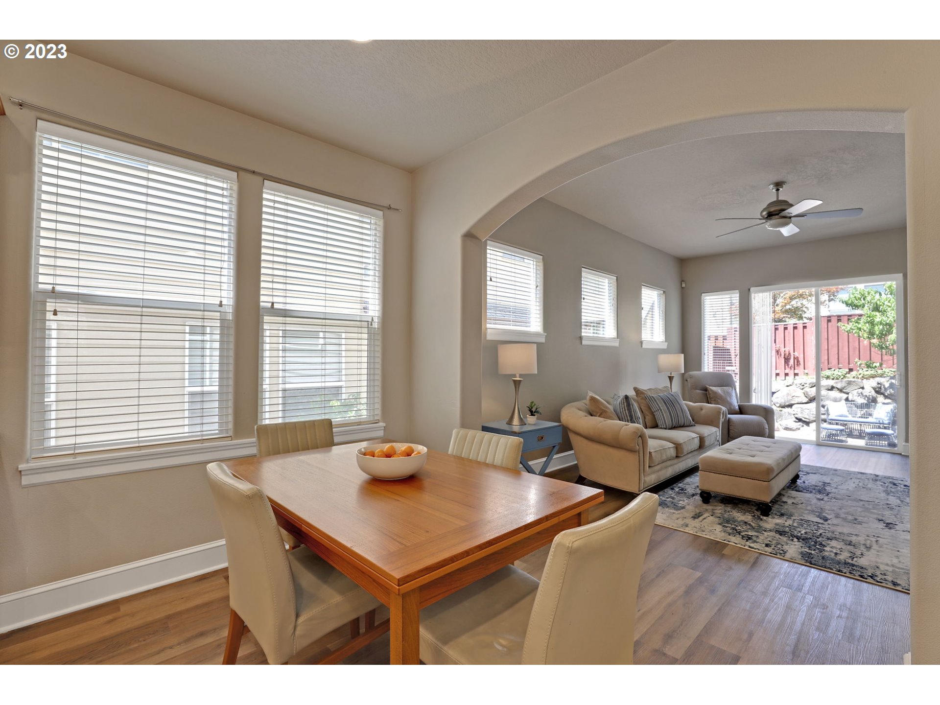 12799 Northwest Forest Spring Lane Portland, OR 97229 - Photo 12 of 30 a living room with furniture and a large window
