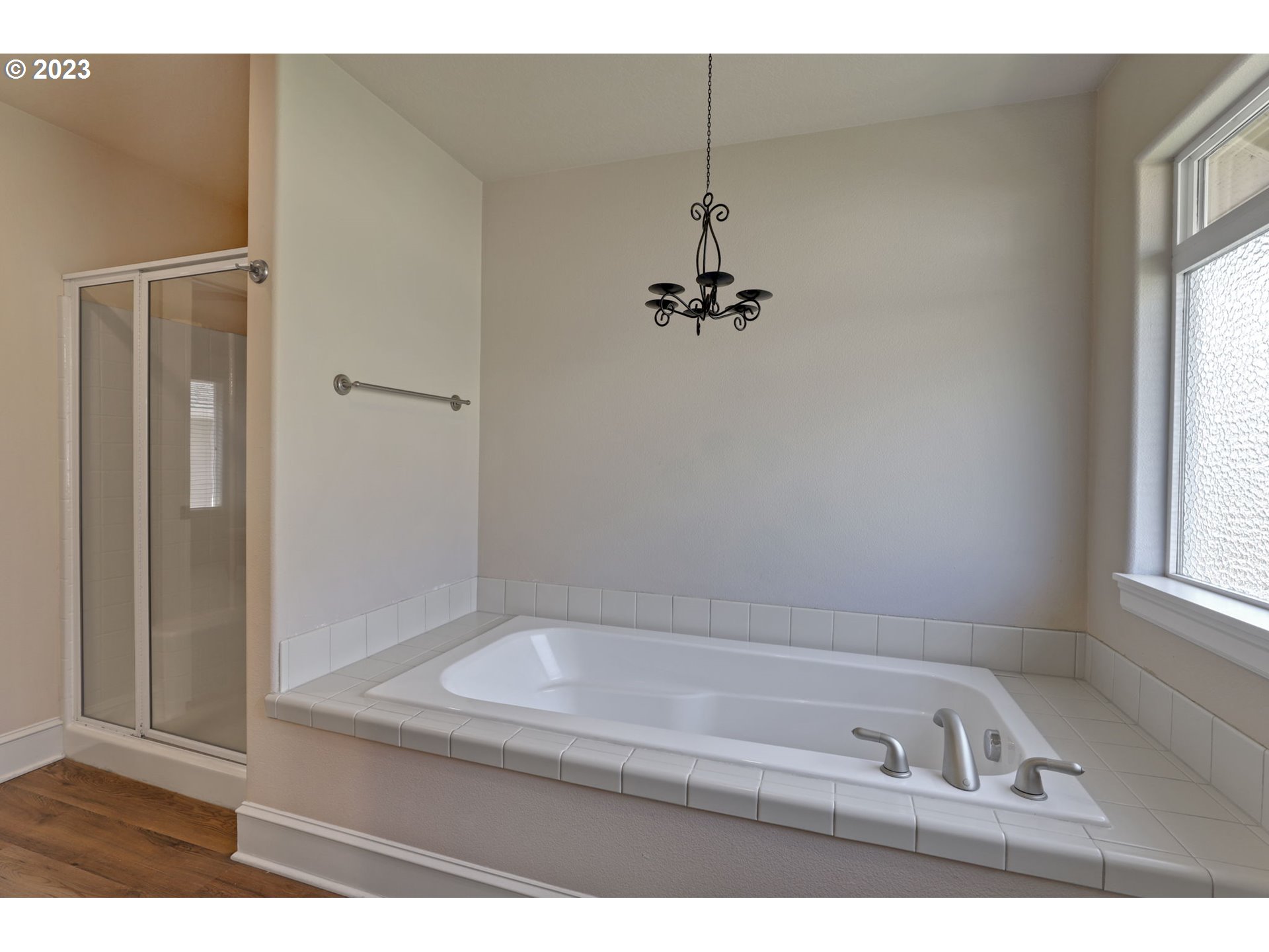 12799 Northwest Forest Spring Lane Portland, OR 97229 - Photo 17 of 30 a bathroom with a bathtub