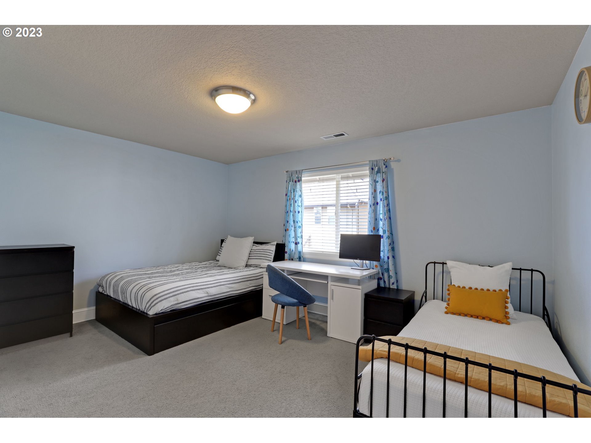 12799 Northwest Forest Spring Lane Portland, OR 97229 - Photo 22 of 30 a bedroom with a bed and a window