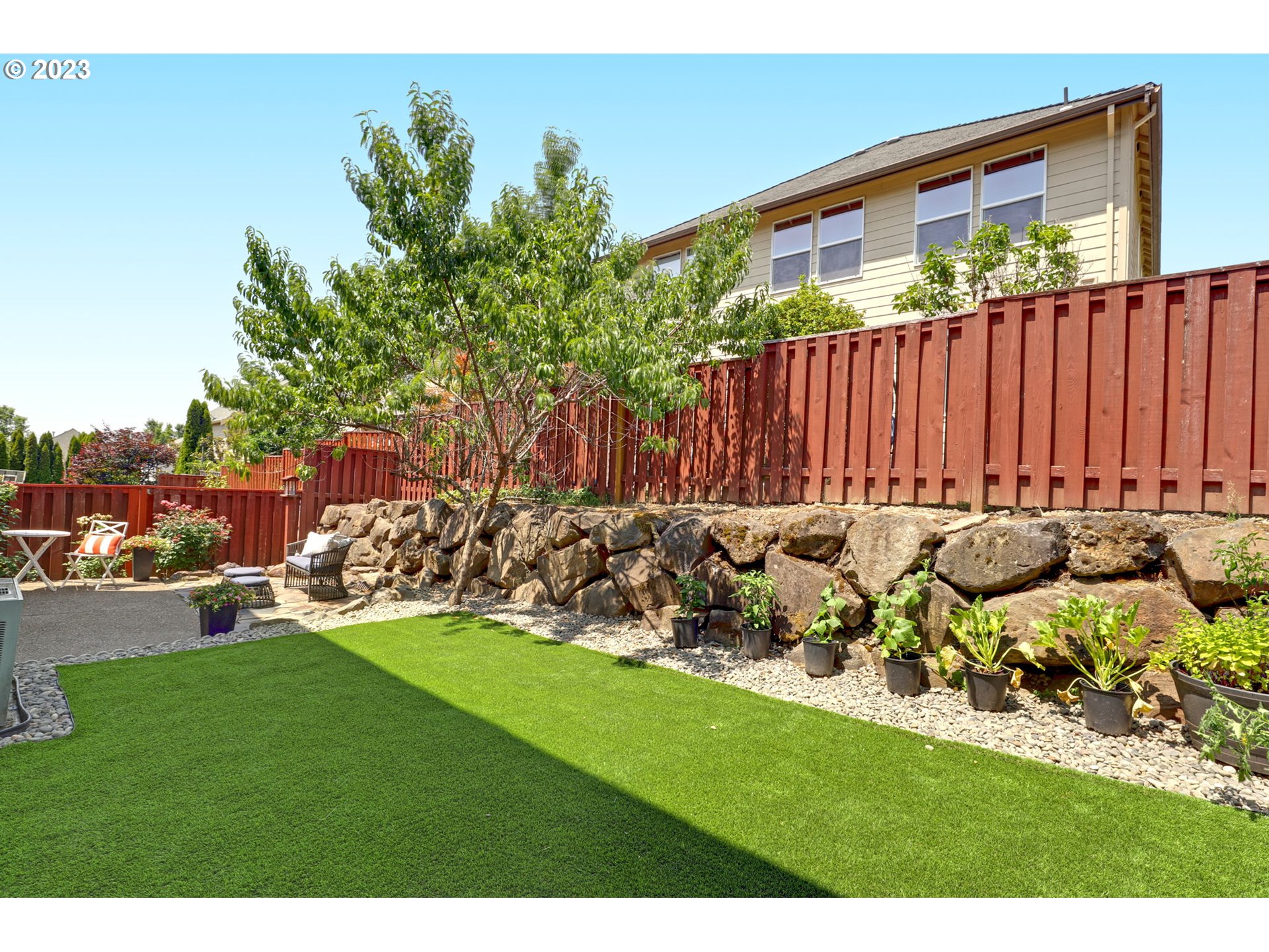 12799 Northwest Forest Spring Lane Portland, OR 97229 - Photo 28 of 30 a view of yard with patio