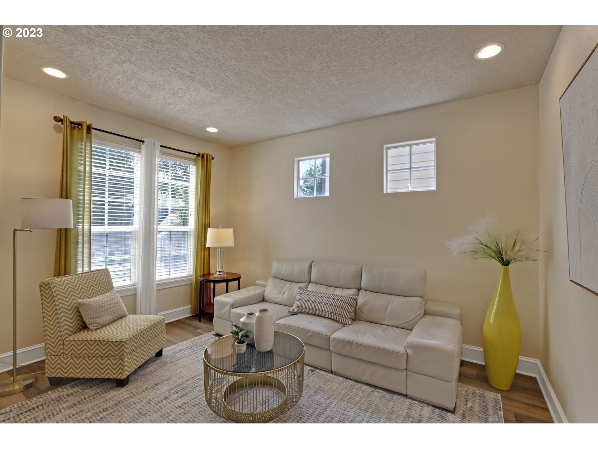 12799 Northwest Forest Spring Lane Portland, OR 97229 - Photo 5 of 30 a living room with furniture and a large window