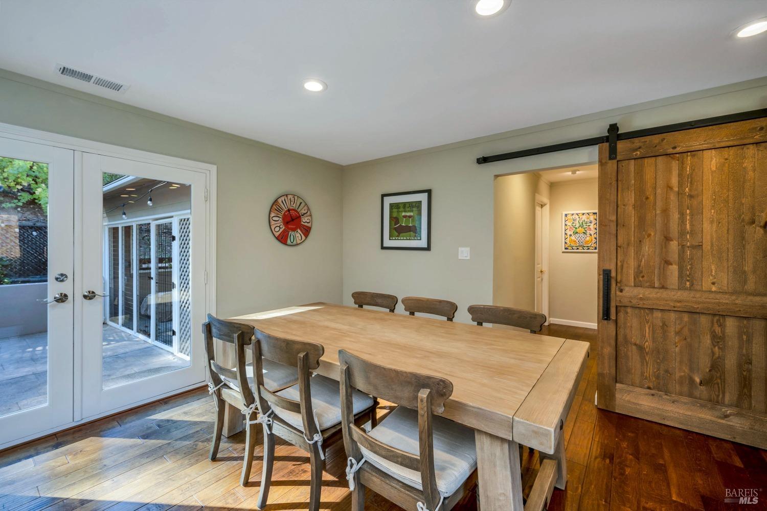 1389 Canyon Road Geyserville, CA 95441 - Photo 16 of 48 a view of a dining room with furniture window and wooden floor