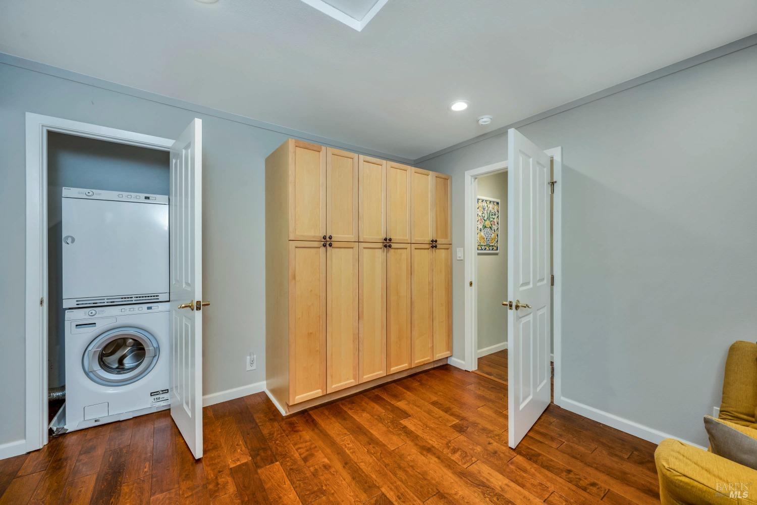 1389 Canyon Road Geyserville, CA 95441 - Photo 25 of 48 a view of a storage & utility room with wooden floor