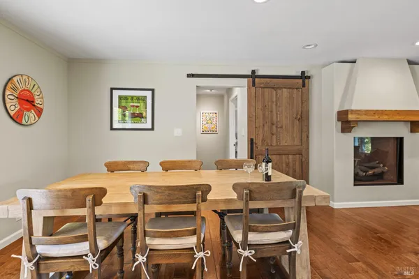 a bathroom with a sink vanity and mirror